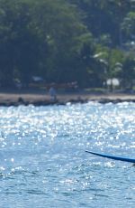 EMMA STONE Surfing in Hawaii
