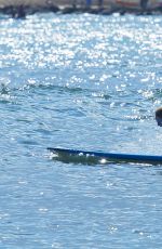 EMMA STONE Surfing in Hawaii