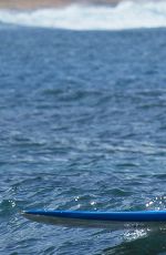 EMMA STONE Surfing in Hawaii