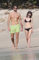 EMMA WATSON and Matthew Janney at a Beach Caribbean