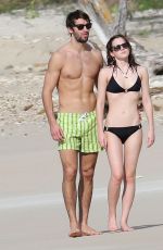 EMMA WATSON and Matthew Janney at a Beach Caribbean