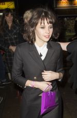 FELICITY JONES Arrives at The Girls Premiere After Party at Cafe de Paris in London