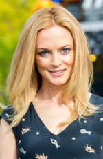 HEATHER GRAHAM on the Set of Extra at the Grove in Los Angeles