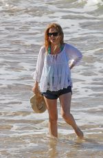 ISLA FISHER in Short Shorts at a Beach in Hawaii