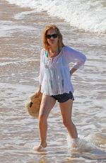 ISLA FISHER in Short Shorts at a Beach in Hawaii