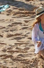 ISLA FISHER in Short Shorts at a Beach in Hawaii