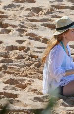 ISLA FISHER in Short Shorts at a Beach in Hawaii