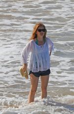 ISLA FISHER in Short Shorts at a Beach in Hawaii