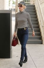 JANUARY JONES Out Shopping in Los Angeles