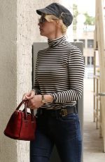 JANUARY JONES Out Shopping in Los Angeles