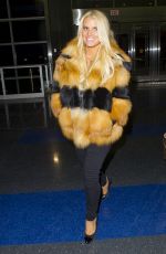 jJESSICA SIMPSON in Coar at JFK Airport in New York