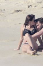 KELLI GARNER in Bikini at a beach in Mexico