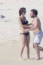 KELLI GARNER in Bikini at a beach in Mexico