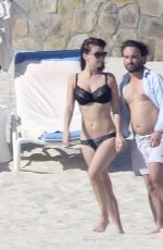 KELLI GARNER in Bikini at a beach in Mexico