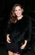 KELLY BROOK in Black Coat Out in London