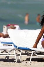 KELLY ROWLAND in Bikini on the Beach in Miami