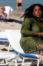 KELLY ROWLAND in Bikini on the Beach in Miami