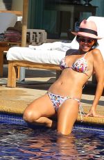 KOURTENY KARDASHIAN in Bikini in the Pool with the Seal