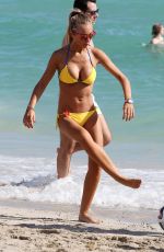 LAURA CREMASCHI in Bikini Playing Football at a Beach in Miami