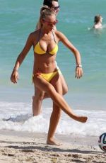 LAURA CREMASCHI in Bikini Playing Football at a Beach in Miami