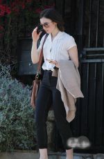 LILY COLLINS Leaves a Friend