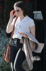 LILY COLLINS Leaves a Friend