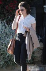 LILY COLLINS Leaves a Friend