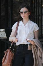 LILY COLLINS Leaves a Friend