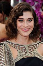 LIZZY CAPLAN at 71st Annual Golden Globe Awards