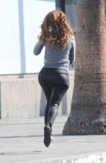 MARIA MENOUNOS in Leather Pants on the Set of Extra