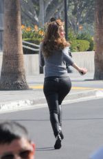 MARIA MENOUNOS in Leather Pants on the Set of Extra