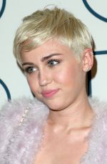 MILEY CYRUS at 2014 Pre-Grammy Gala in Beverly Hills