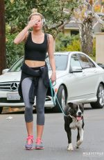 MILEY CYRUS in Tight Walks Her Dog Out in Los Angeles