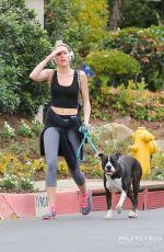 MILEY CYRUS in Tight Walks Her Dog Out in Los Angeles