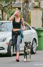 MILEY CYRUS in Tight Walks Her Dog Out in Los Angeles