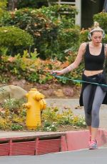 MILEY CYRUS in Tight Walks Her Dog Out in Los Angeles