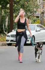 MILEY CYRUS in Tight Walks Her Dog Out in Los Angeles