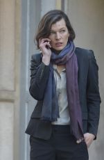 MILLA JOVOVIH on the Set of  Survivor