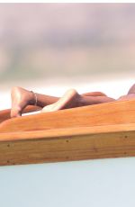 NAOMI CAMPBELL in Bikini at a Boat in Kenya