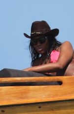 NAOMI CAMPBELL in Bikini at a Boat in Kenya