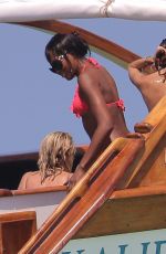 NAOMI CAMPBELL in Bikini at a Boat in Kenya