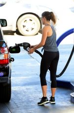NIKKI REED in Tights at a Gas Station in Los Angeles
