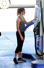 NIKKI REED in Tights at a Gas Station in Los Angeles