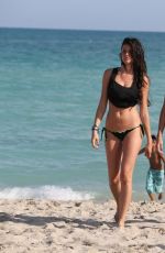 OLGA KENT in Tiny Bikini on the Beach in Miami