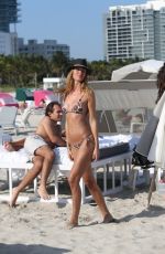 OLGA KENT in Tiny Bikini on the Beach in Miami