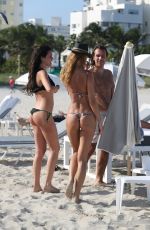 OLGA KENT in Tiny Bikini on the Beach in Miami