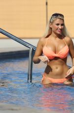 SAM and BILLIE FAIERS in Bikinis at a Pool in Dubai