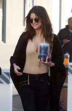 SELENA GOMEZ at a Gas Station