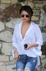 SELENA GOMEZ in Ripped Jeans Out in Los Angeles