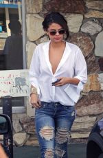 SELENA GOMEZ in Ripped Jeans Out in Los Angeles